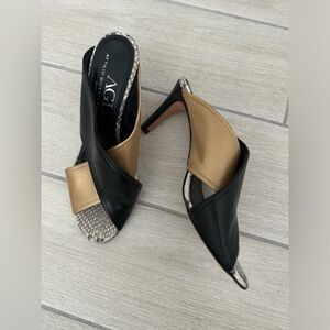AGL Italian sandal heels in black and gold.
